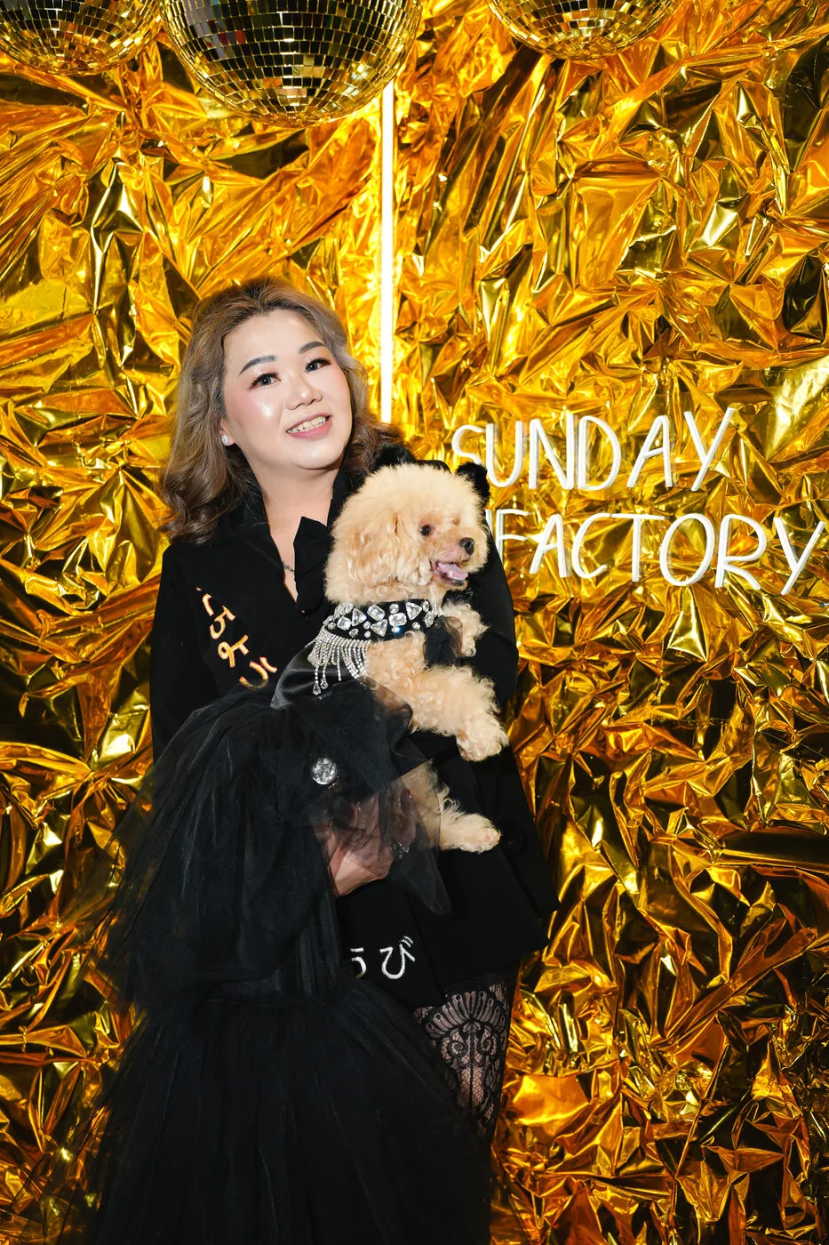 Owner with her dog at a Sunday Fun Factory event